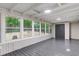 Bright sunroom featuring multiple windows offering backyard views at 4212 Bryan Se Dr, Acworth, GA 30102