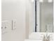Bright bathroom features modern faucet, lighting, and pristine white walls at 6429 Woodstone Way, Morrow, GA 30260