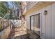 Enclosed patio with sliding glass door provides a private outdoor space at 6429 Woodstone Way, Morrow, GA 30260