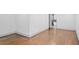 Open bedroom layout with wood flooring and natural light, attached bathroom is visible at 664 Florence Nw Pl, Atlanta, GA 30318