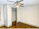 This bedroom has hardwood floors, natural light and a closet at 664 Florence Nw Pl, Atlanta, GA 30318