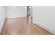 Spacious bedroom featuring hardwood floors and neutral paint, creating a serene atmosphere at 664 Florence Nw Pl, Atlanta, GA 30318