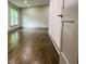 Spacious bedroom featuring hardwood floors, lots of natural light, and neutral paint at 664 Florence Nw Pl, Atlanta, GA 30318