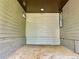 Spacious, empty carport with room for vehicle parking and storage at 664 Florence Nw Pl, Atlanta, GA 30318