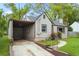 A view of the side of a single story home featuring a carport at 664 Florence Nw Pl, Atlanta, GA 30318