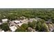 Aerial view of a residential neighborhood, with commercial buildings in the distance at 1003 North Ne Ave, Atlanta, GA 30306