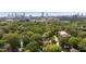 Aerial view of a residential neighborhood, with Atlanta's skyline visible in the distance at 1003 North Ne Ave, Atlanta, GA 30306