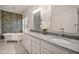 Stylish bathroom with double sink vanity, marble countertops and clawfoot tub at 1003 North Ne Ave, Atlanta, GA 30306