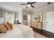 Beautiful bedroom with ensuite bathroom, desk, and decor to enhance the light grey walls at 1003 North Ne Ave, Atlanta, GA 30306