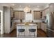 Bright eat-in kitchen featuring granite counters, stainless steel appliances, and an island with seating at 1003 North Ne Ave, Atlanta, GA 30306