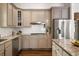 Modern kitchen with stainless appliances, granite countertops, and painted cabinets at 1003 North Ne Ave, Atlanta, GA 30306
