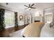 Spacious main bedroom features fireplace, ceiling fan and hardwood floors at 1003 North Ne Ave, Atlanta, GA 30306