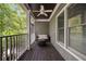 Relaxing covered porch with comfortable seating and wooded view at 1003 North Ne Ave, Atlanta, GA 30306
