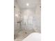 Luxurious tiled shower with glass door and built-in bench at 1003 North Ne Ave, Atlanta, GA 30306