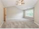 Large main bedroom with vaulted ceilings and large window at 11576 Kades Trl, Hampton, GA 30228