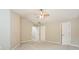 Large bedroom features ceiling fan and multiple doors at 11576 Kades Trl, Hampton, GA 30228