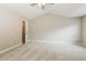 Spacious bedroom features vaulted ceilings and new carpet at 11576 Kades Trl, Hampton, GA 30228
