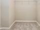 Walk-in closet features a wire shelving system for optimal storage at 11576 Kades Trl, Hampton, GA 30228
