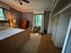Bedroom featuring hardwood floors, ample closet space, and modern furnishings at 224 Sourwood Dr, Marietta, GA 30062