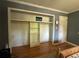 Spacious bedroom with large closet and neutral color scheme at 224 Sourwood Dr, Marietta, GA 30062
