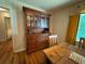 Dining room with hardwood floors, hutch, and window views to the yard at 224 Sourwood Dr, Marietta, GA 30062