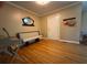 Cozy entryway featuring gleaming wood floors, a comfortable bench, and a welcoming atmosphere at 224 Sourwood Dr, Marietta, GA 30062