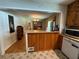 Kitchen and dining room featuring ample cabinet space, an island and access to dining area at 224 Sourwood Dr, Marietta, GA 30062