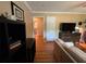 Comfortable living space with hardwood floors, modern entertainment setup, and a seamless flow into other areas at 224 Sourwood Dr, Marietta, GA 30062