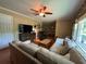 Spacious living room with hardwood floors, comfortable seating, and stylish decor, perfect for relaxation at 224 Sourwood Dr, Marietta, GA 30062