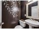 Stylish half bathroom with designer mirror and sink at 3150 Stonewyck Pl, Decatur, GA 30033