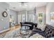 Comfortable living room with beautiful hardwood floors and stylish furniture at 3150 Stonewyck Pl, Decatur, GA 30033