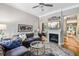 Inviting living room featuring a fireplace, comfortable seating, and stylish decor at 3150 Stonewyck Pl, Decatur, GA 30033