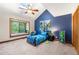 Cozy bedroom with a window seat, vaulted ceiling, and a playful design at 4710 Misty Lake Ne Ct, Kennesaw, GA 30144