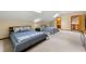 Spacious bedroom with skylights, two beds, and ensuite bathroom access at 4710 Misty Lake Ne Ct, Kennesaw, GA 30144