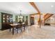 Inviting dining room with elegant furnishings, a view to the staircase, and access to the kitchen at 4710 Misty Lake Ne Ct, Kennesaw, GA 30144