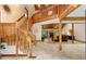 Bright foyer with stairs leading up, open floor plan, and views of the living room at 4710 Misty Lake Ne Ct, Kennesaw, GA 30144