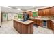 An open concept kitchen with granite countertops, stainless steel appliances, and center island at 4710 Misty Lake Ne Ct, Kennesaw, GA 30144