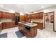 A beautifully crafted kitchen featuring an island cooktop and granite countertops at 4710 Misty Lake Ne Ct, Kennesaw, GA 30144