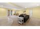 Open living area featuring a cozy couch, dining table, and outdoor access at 4710 Misty Lake Ne Ct, Kennesaw, GA 30144
