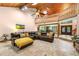 Open living room with balcony, vaulted wood ceiling and stone-look flooring at 4710 Misty Lake Ne Ct, Kennesaw, GA 30144