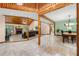 Open-concept layout featuring a spacious living room, fireplace, and access to the dining area at 4710 Misty Lake Ne Ct, Kennesaw, GA 30144
