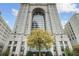 Beautiful building with lush landscaping and a grand entrance at 75 14Th St Ne # 4140, Atlanta, GA 30309