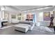 Open-concept main room featuring a luxurious soaking tub, large art display, and modern decor at 75 14Th St Ne # 4140, Atlanta, GA 30309