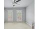 Spacious bedroom features two windows with shutter blinds and neutral colored walls at 1211 Riverscall Ln, Atlanta, GA 30339