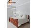 Spacious bedroom featuring a ceiling fan, natural light, and a comfortable wooden bed frame at 1211 Riverscall Ln, Atlanta, GA 30339