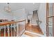 Inviting foyer with hardwood floors, staircase, and a view into other rooms at 1211 Riverscall Ln, Atlanta, GA 30339