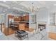 Open-concept living space with a fireplace, built-ins, and seamless transition to the kitchen area at 1211 Riverscall Ln, Atlanta, GA 30339