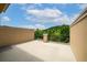 Private patio area with a view of lush green landscape and trees at 1211 Riverscall Ln, Atlanta, GA 30339