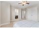 Comfortable bedroom showcasing easy access to the bathroom and closets at 4815 Edgemoore Trce, Cumming, GA 30040