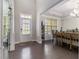 Open concept dining area with hardwood floors and plenty of natural light at 4815 Edgemoore Trce, Cumming, GA 30040